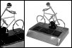Press for a larger picture Solar powered aluminium cyclist